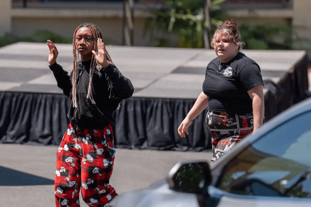 Students, staff and others are escorted out of buildings after shots were fired on the campus of Florida State University on Thursday, April 17, 2025.